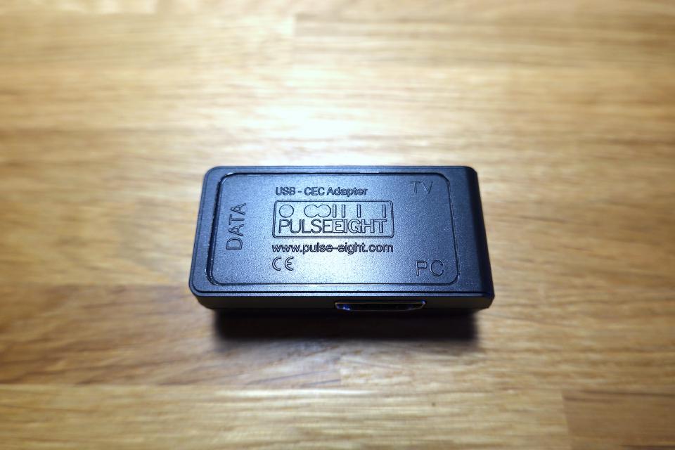 The same device, top view. The ports are marked: DATA, TV, PC.